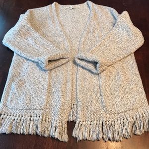 Hardly worn cardigan with cute tassels